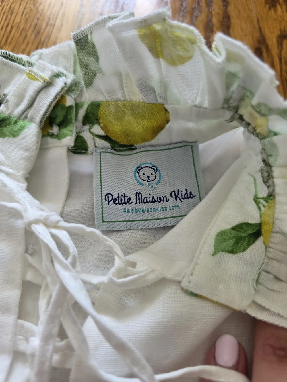 White Lemon-Print Baby Dress Romper with Gold Accent